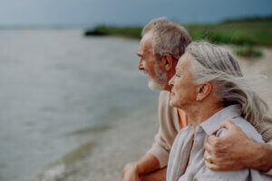 An elderly couple contemplating donating retirement assets to a charity of their choice in Miami County, KS. 