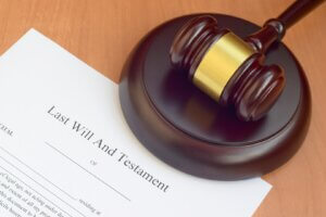 A close-up view of a document titled "Will and Testament," highlighting a key component of estate planning strategies. This document is pivotal in distributing an individual's estate according to their wishes.