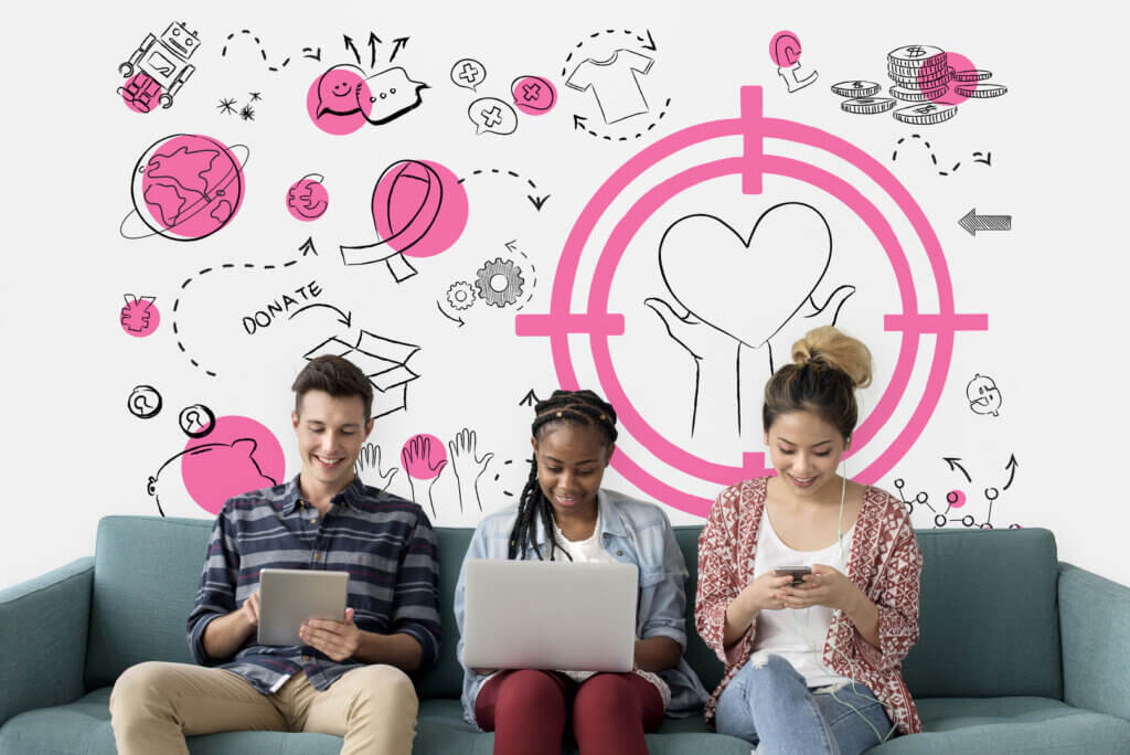 Illustration of three young people with laptops on a sofa