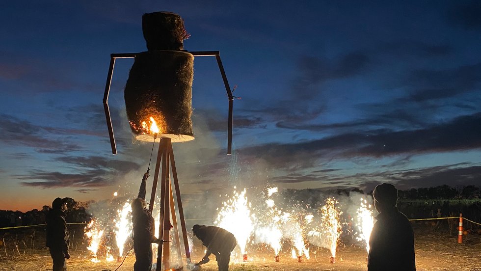 Fireworks around the burning scarecrow at Louisburg Cider Mill